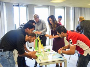 HEC Paris' “Act your Success” is a three-day seminar where fellow MBA students interact for the first time, with activities like engineering a paper roller coaster.