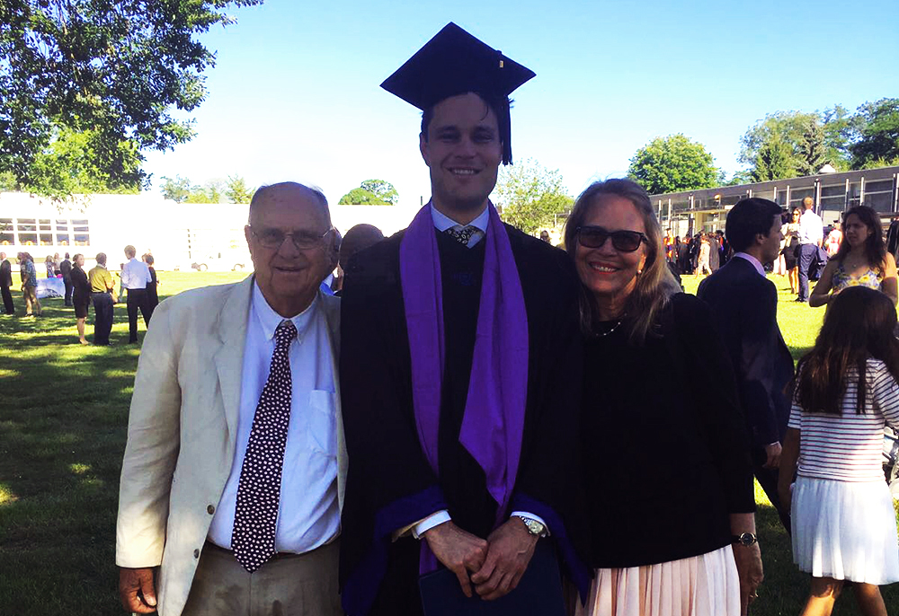 Erik Strong with his parents at graduation
