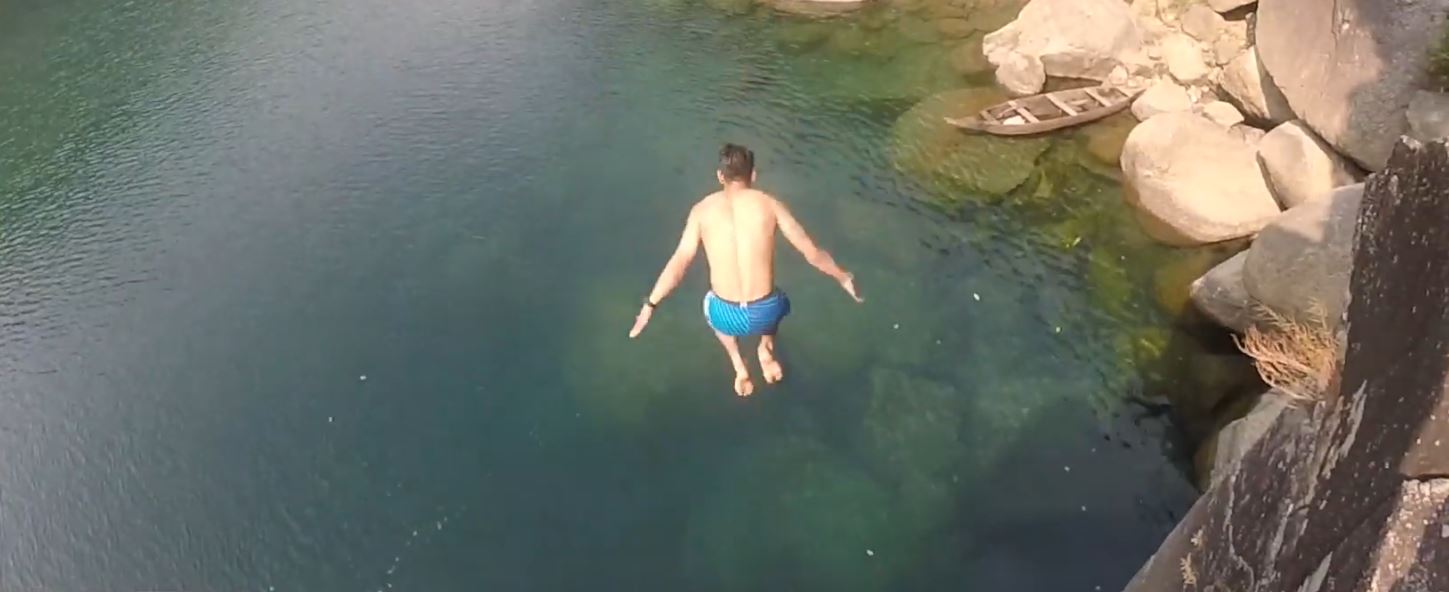 jumping into a lake from high above