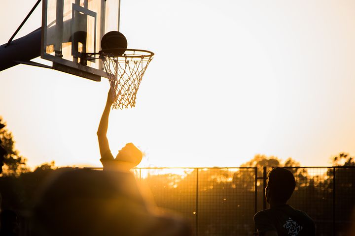 Shooting a basketball shot during sunset is a great metaphor for salary negotiations